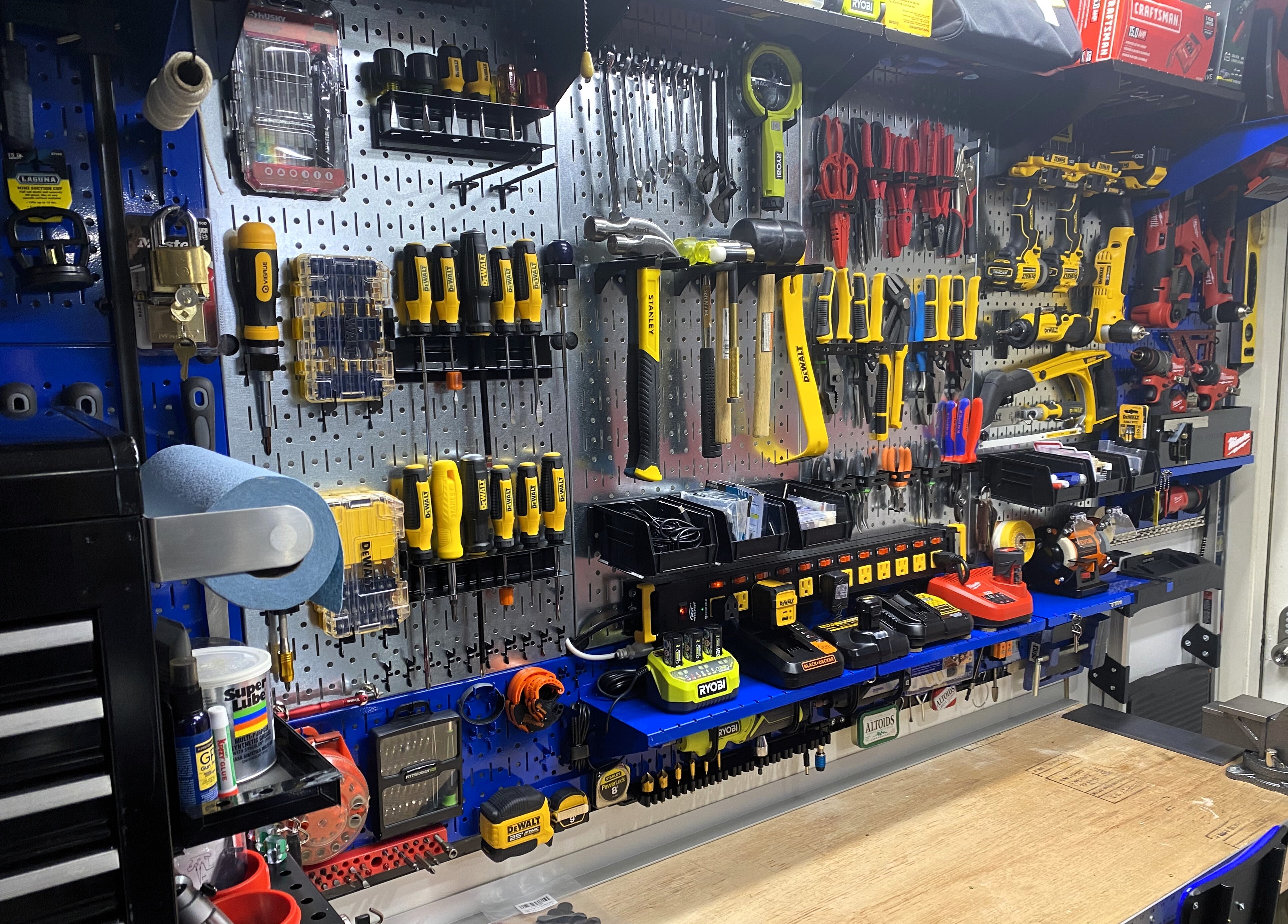 Wall Control metal pegboard tool wall organizing power tools, hand tools, chargers, and workshop accessories